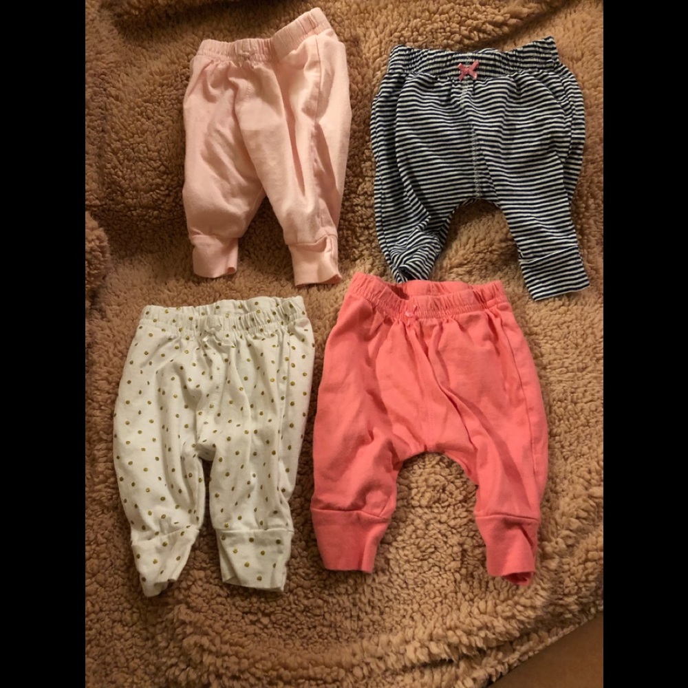 Four pairs of newborn pants